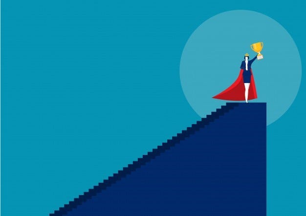 victoria-riess-hero-woman-doing-office-work-homework-alone-super-woman