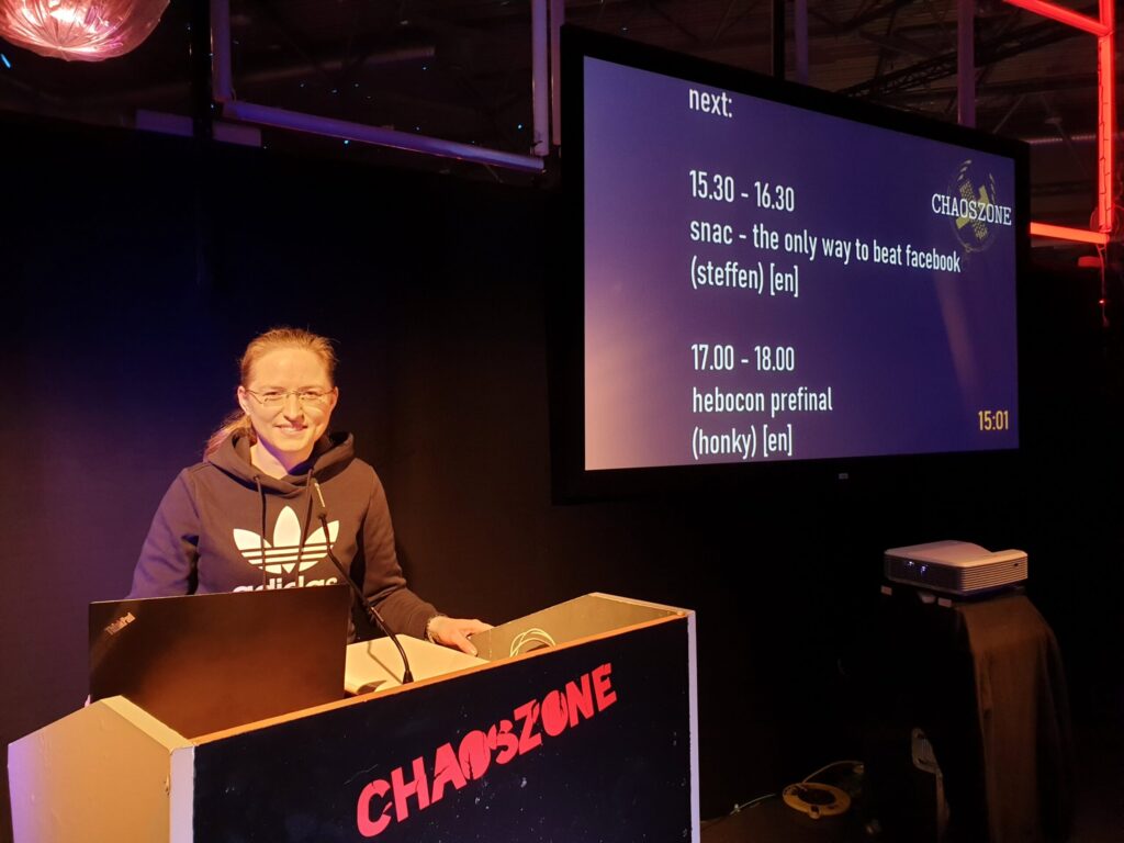 victoria-riess-woman-leader-tacking-the-stage-at-technology-conference